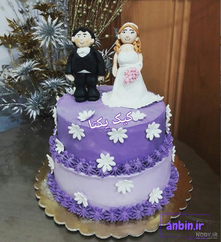 عکس کیک بریدن عروس و داماد